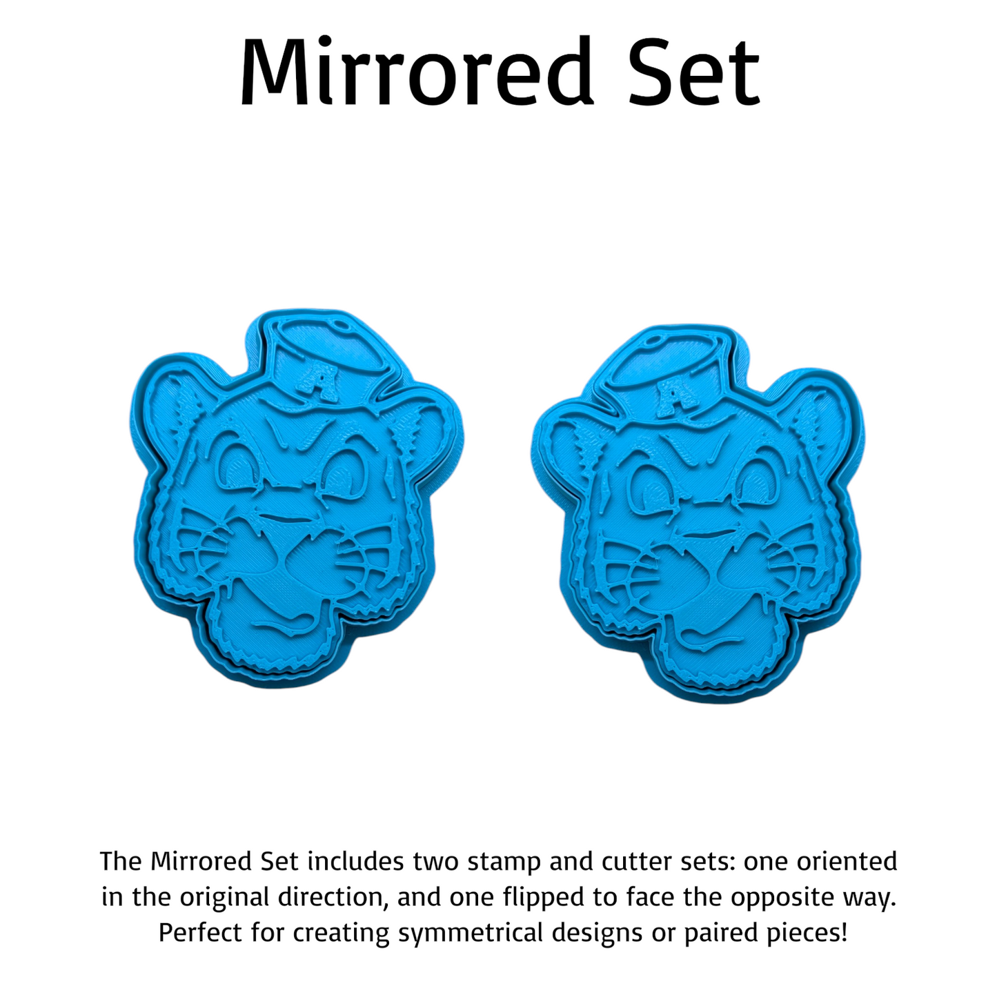 Mirrored Auburn Tiger stamp and cutter set – two blue 3D‑printed tiger faces facing opposite directions for symmetrical cookie or clay designs.