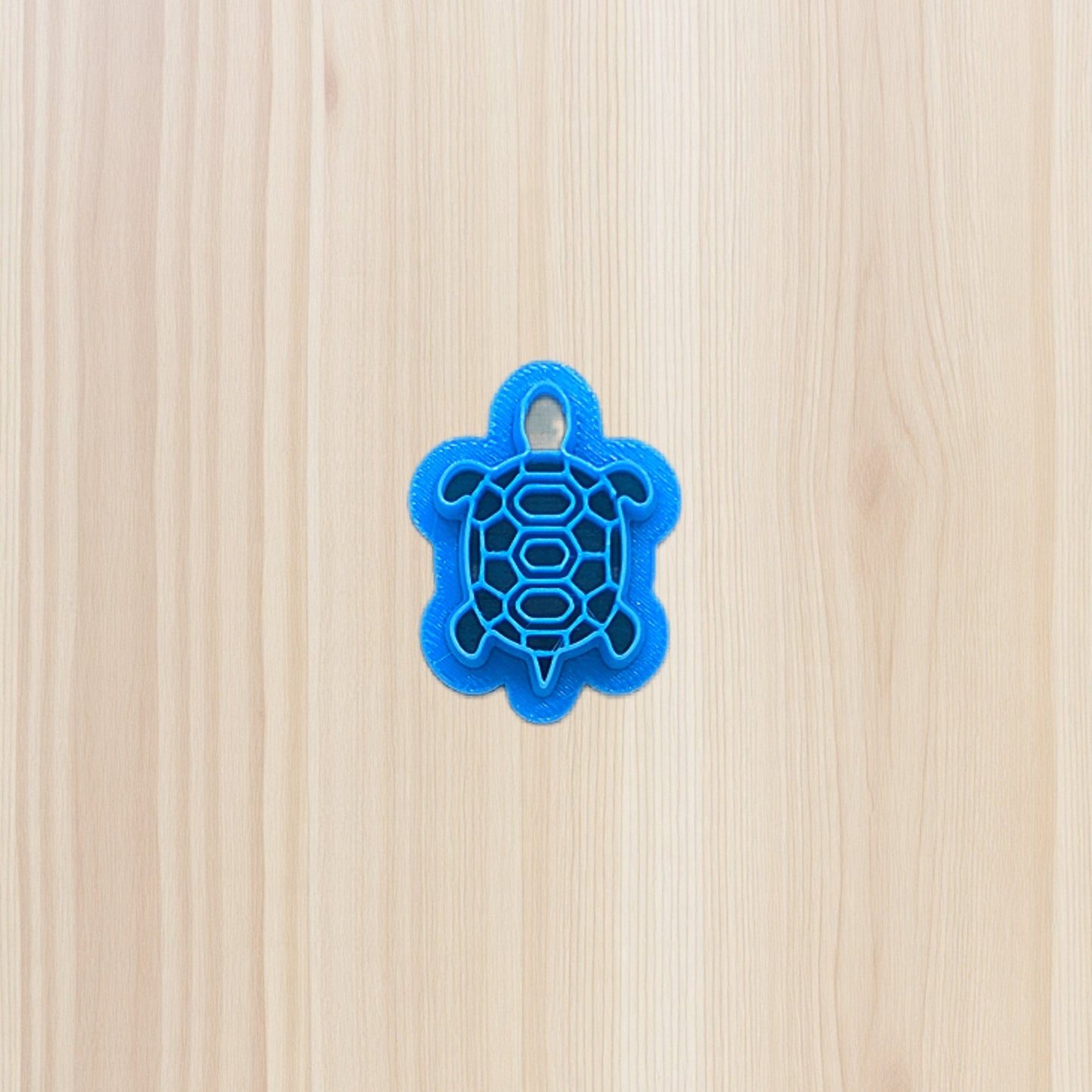 3D-printed box turtle cookie cutter with shell detail, crafted in blue food-safe plasticāperfect for cookies, fondant, clay, and ceramics