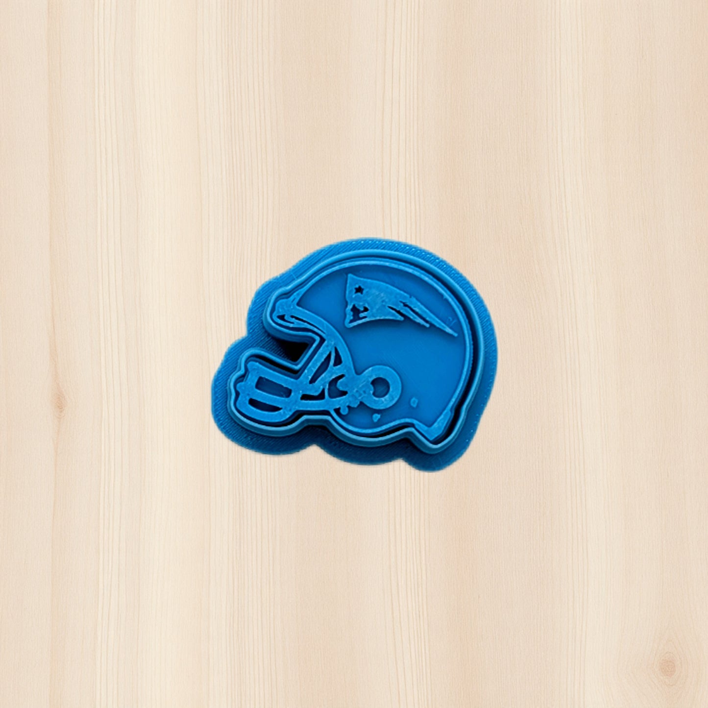 New England Patriots football helmet cookie cutter and stamp set for detailed cookies, fondant, and polymer clay crafts, featuring crisp teamāinspired lines for game day baking and sportsāthemed projects.