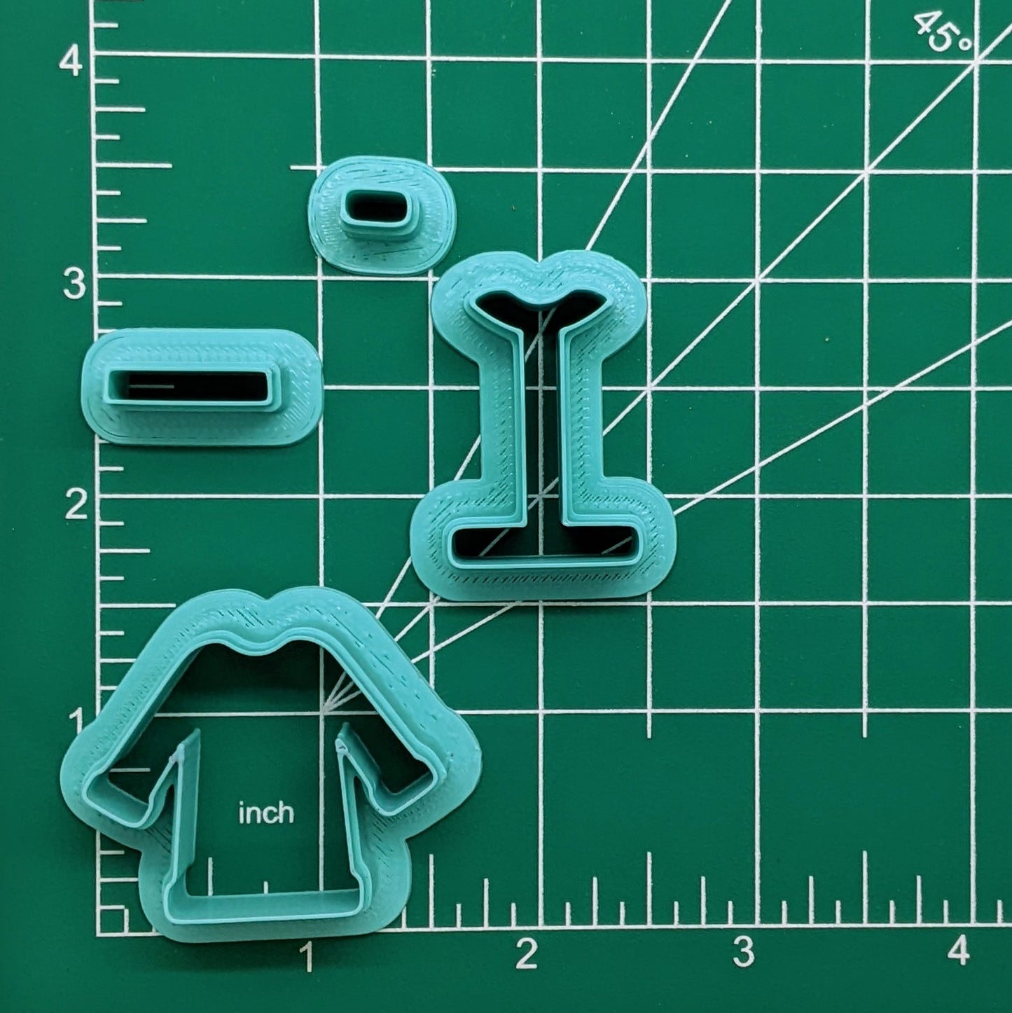 4 Piece Santa Claus Coat Cookie Cutter Set: Ideal for Cookies, Ceramics, Pottery, Polymer Clay, and Fondant