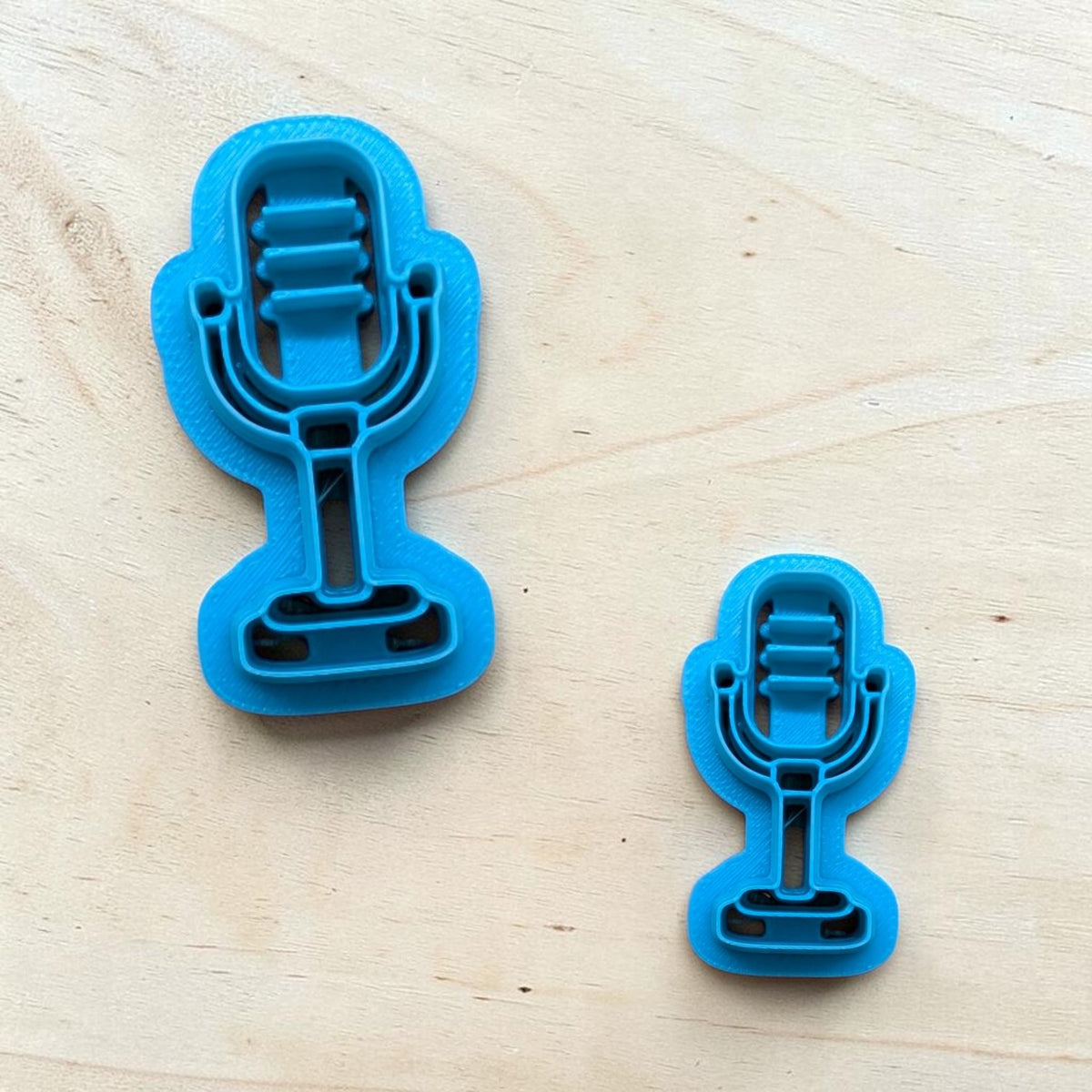 Blue Ribbon Microphone Cookie Cutter showing detailed retro microphone shape — 3D‑printed tool for baking, fondant, clay, and ceramics.