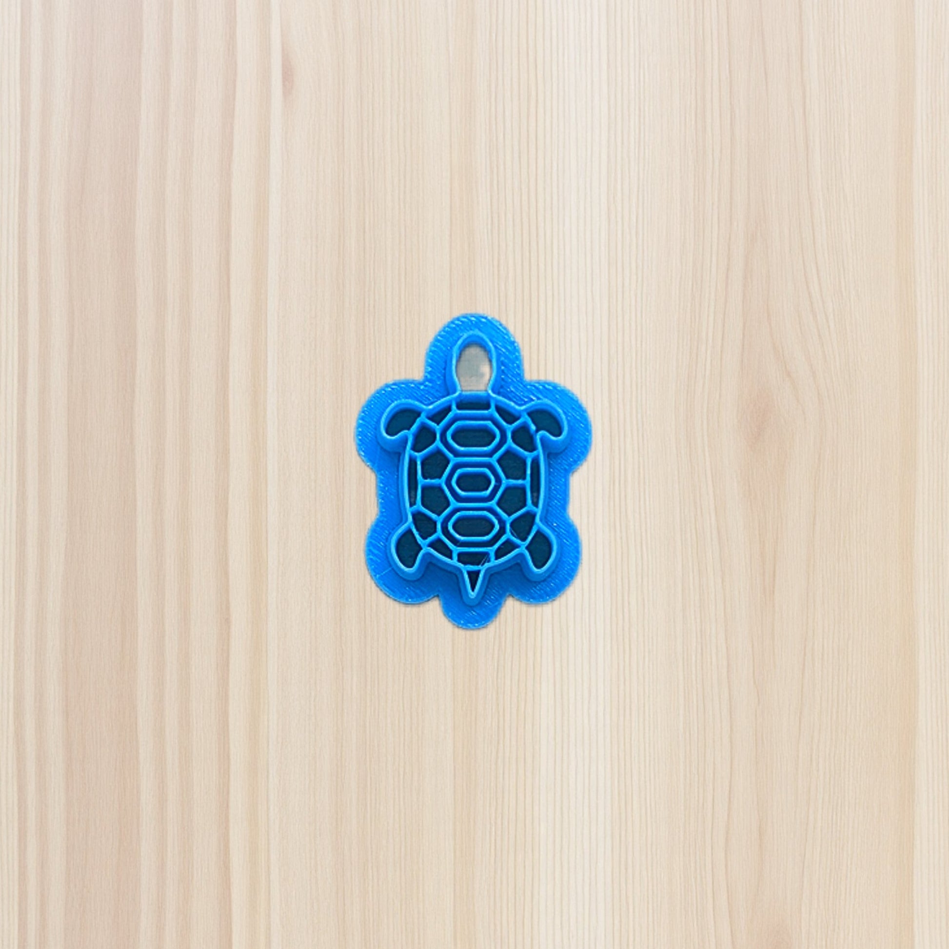 3D-printed box turtle cookie cutter with shell detail, crafted in blue food-safe plastic—perfect for cookies, fondant, clay, and ceramics