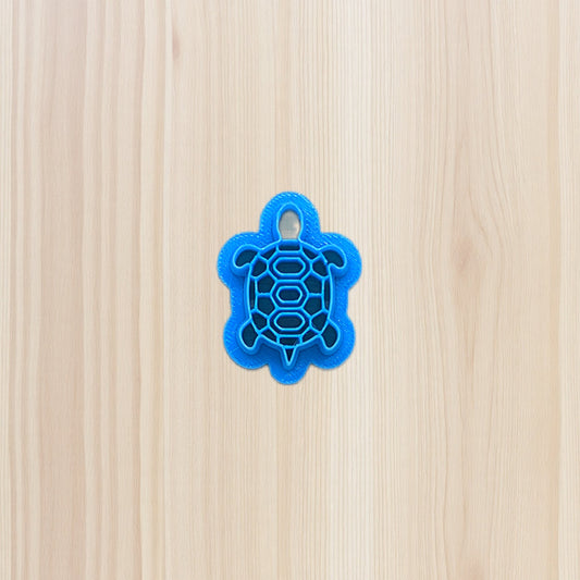 3D-printed box turtle cookie cutter with shell detail, crafted in blue food-safe plastic—perfect for cookies, fondant, clay, and ceramics