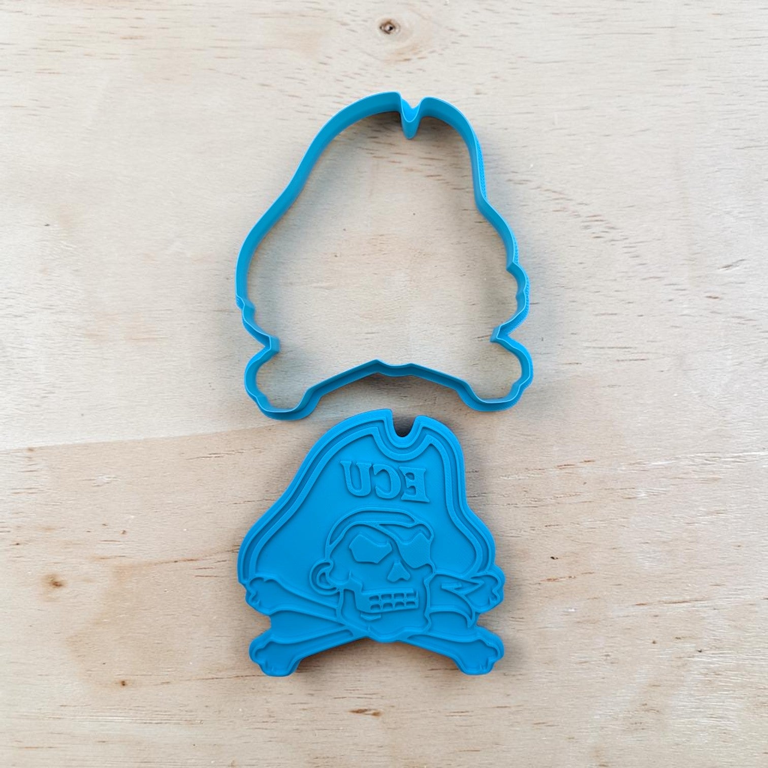 ECU Pirates stamp and cutter set with skull and crossbones on a white background.