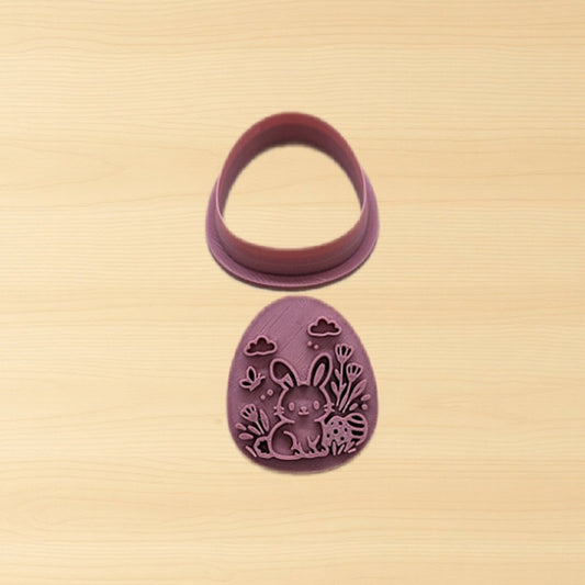 Purple Easter-themed cookie cutter on a beige background