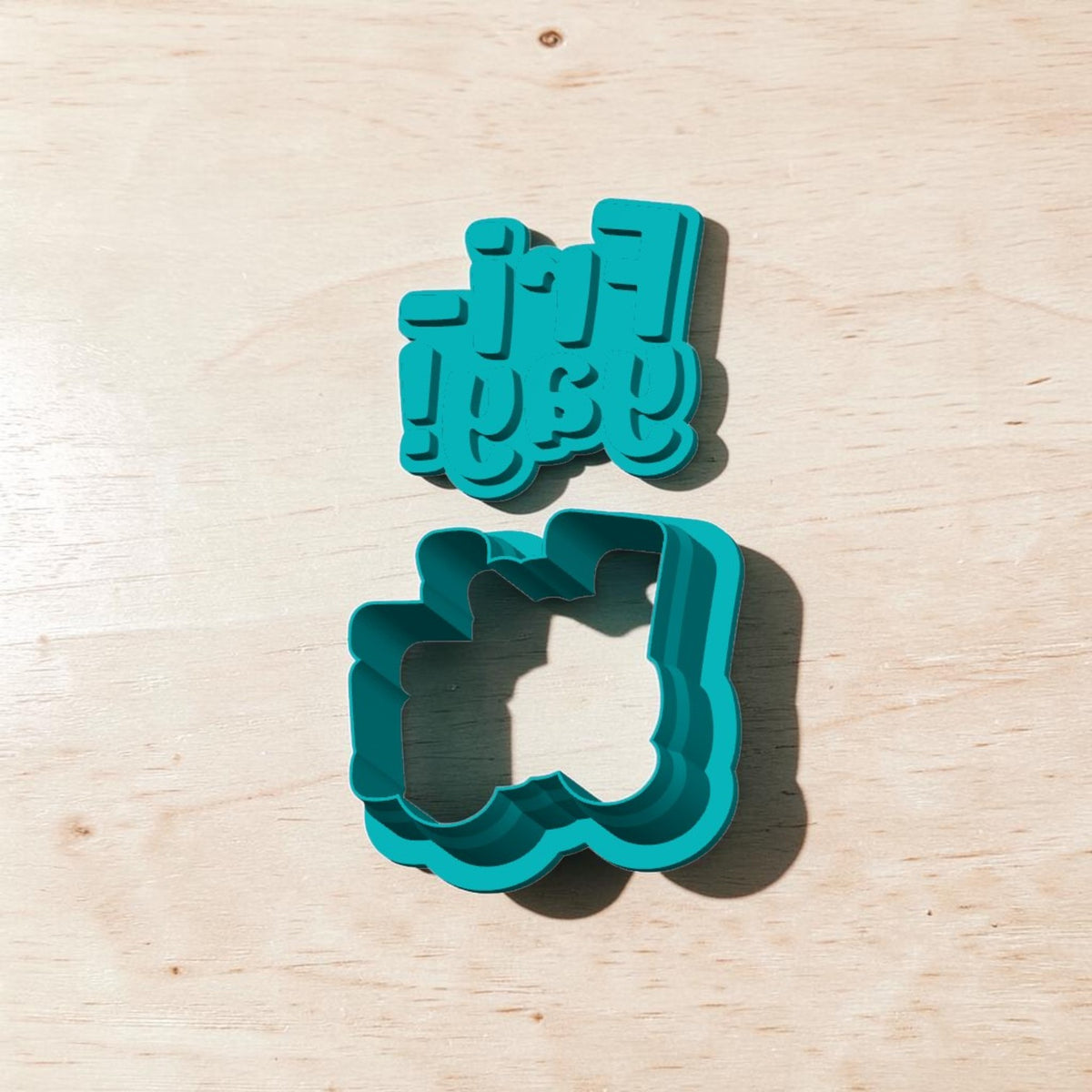 Turquoise 3D printed Fri-Yay! cookie cutter and embossing stamp set with raised lettering for cookies, polymer clay earrings, fondant, pottery and ceramic crafts