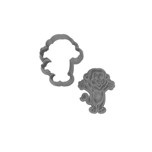 Metallic lion-shaped cookie cutter on a white background