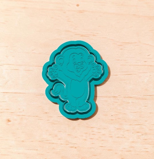 Teal Joyful Lion cookie cutter and embossing stamp by Truley Unique — detailed lion design for cookies, fondant, ceramics, or polymer clay.
