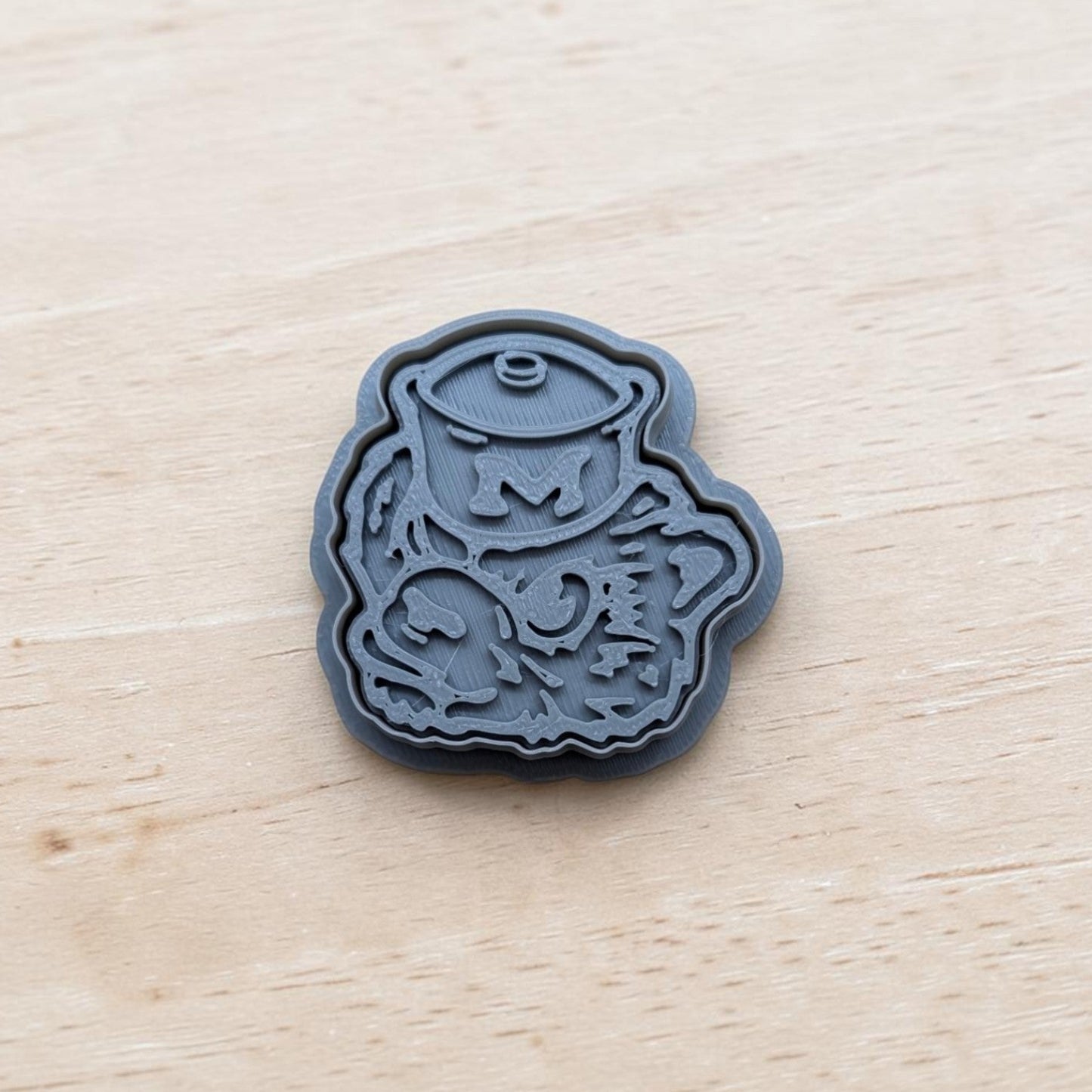 Michigan Wolverines cookie cutter and stamp set featuring vintage sailor hat design, 3D printed in gray for cookies, fondant, and clay crafts.