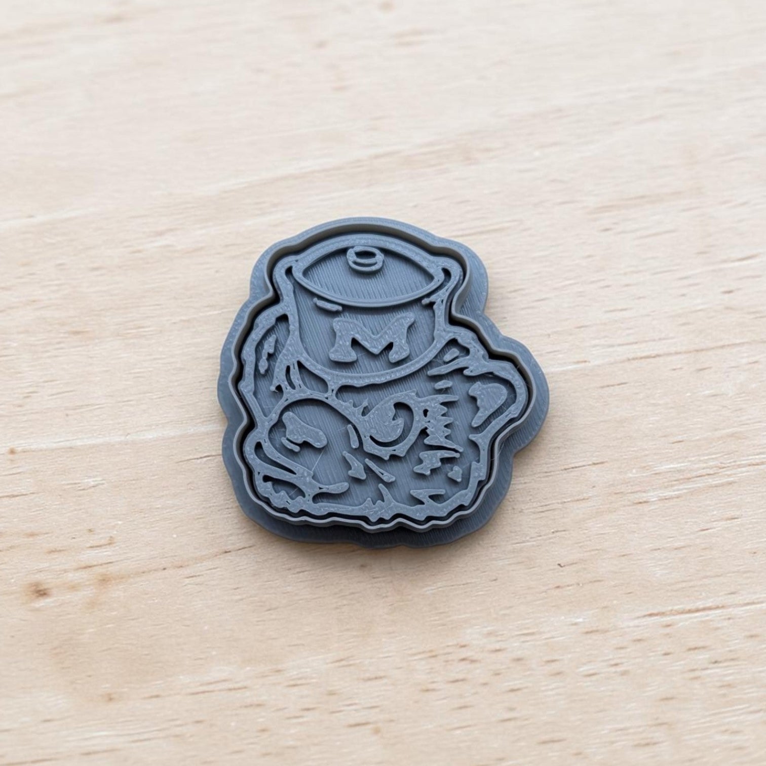 Michigan Wolverines cookie cutter and stamp set featuring vintage sailor hat design, 3D printed in gray for cookies, fondant, and clay crafts.