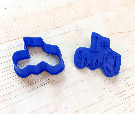 plastic blue Number 1 Dad cookie cutter and stamp set