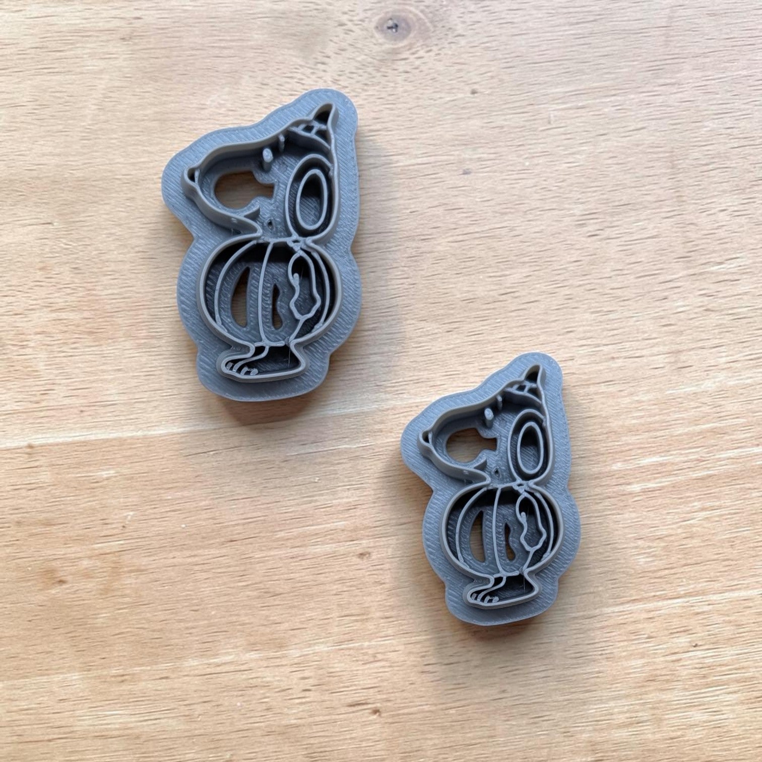 Snoopy pumpkin cookie cutter – handmade 3D printed tool for polymer clay, fondant, and ceramic projects.