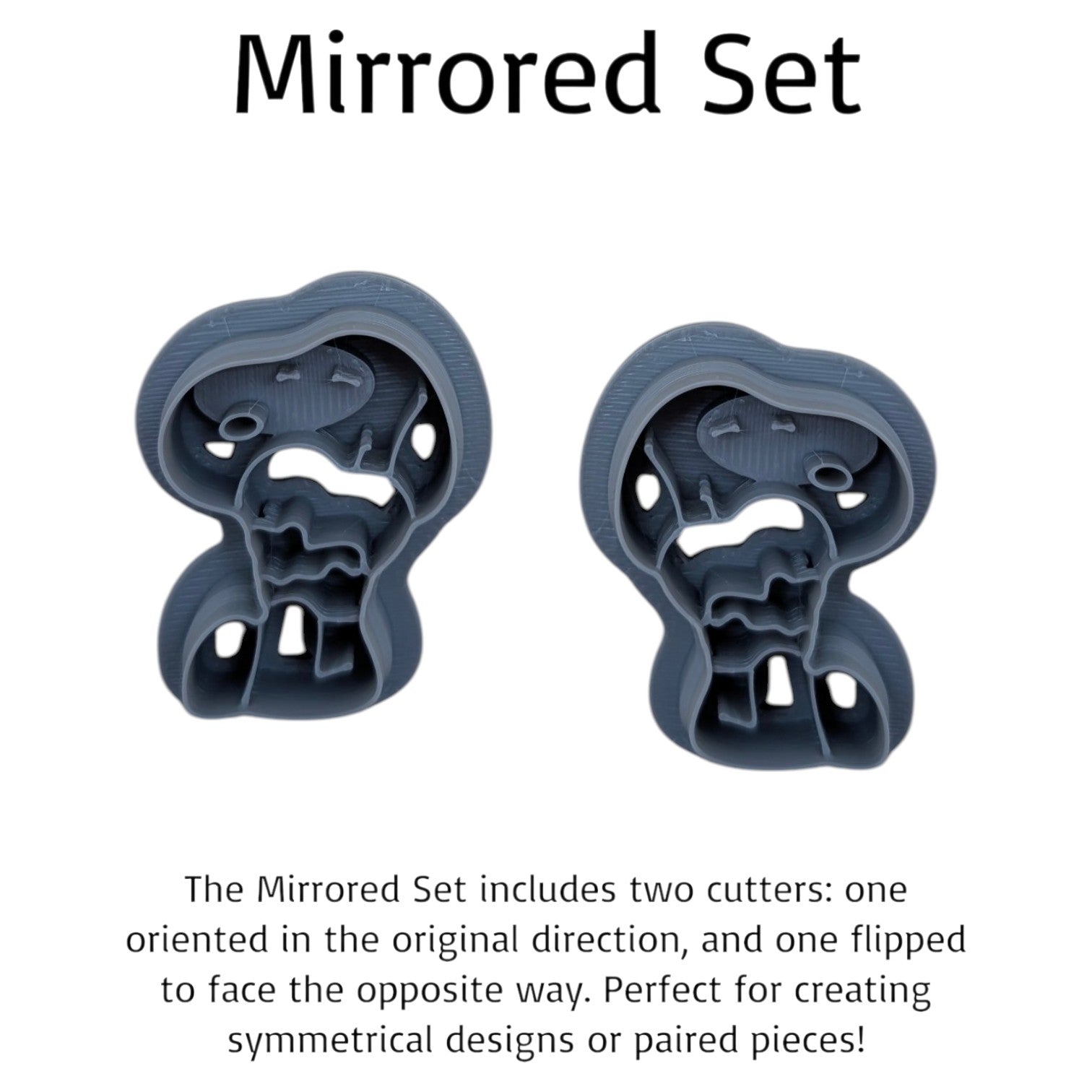 Mirrored Snoopy hugging a heart cookie cutter set — two gray 3D‑printed cutters facing opposite directions for symmetrical cookie or clay designs.