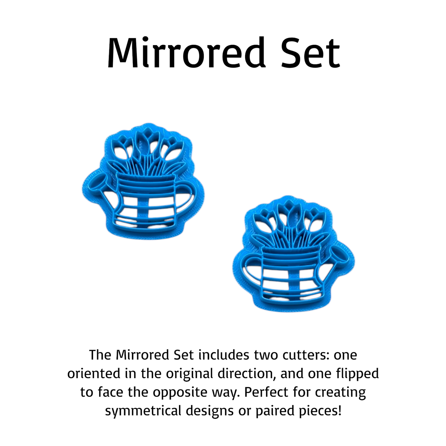 Two blue cookie cutters with a mirrored design on a white background.