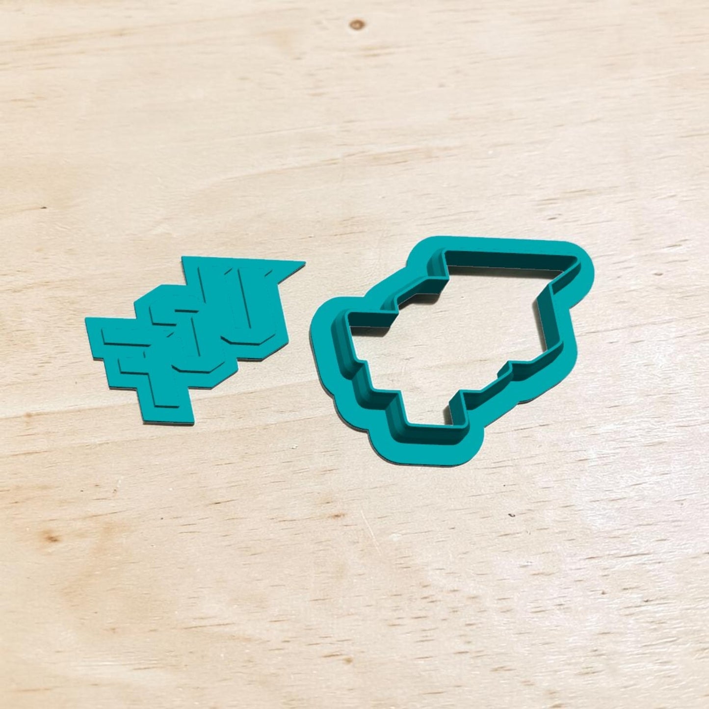 UCF logo cookie cutter and matching stamp set — teal 3D‑printed tools for baking, ceramics, and clay crafts.