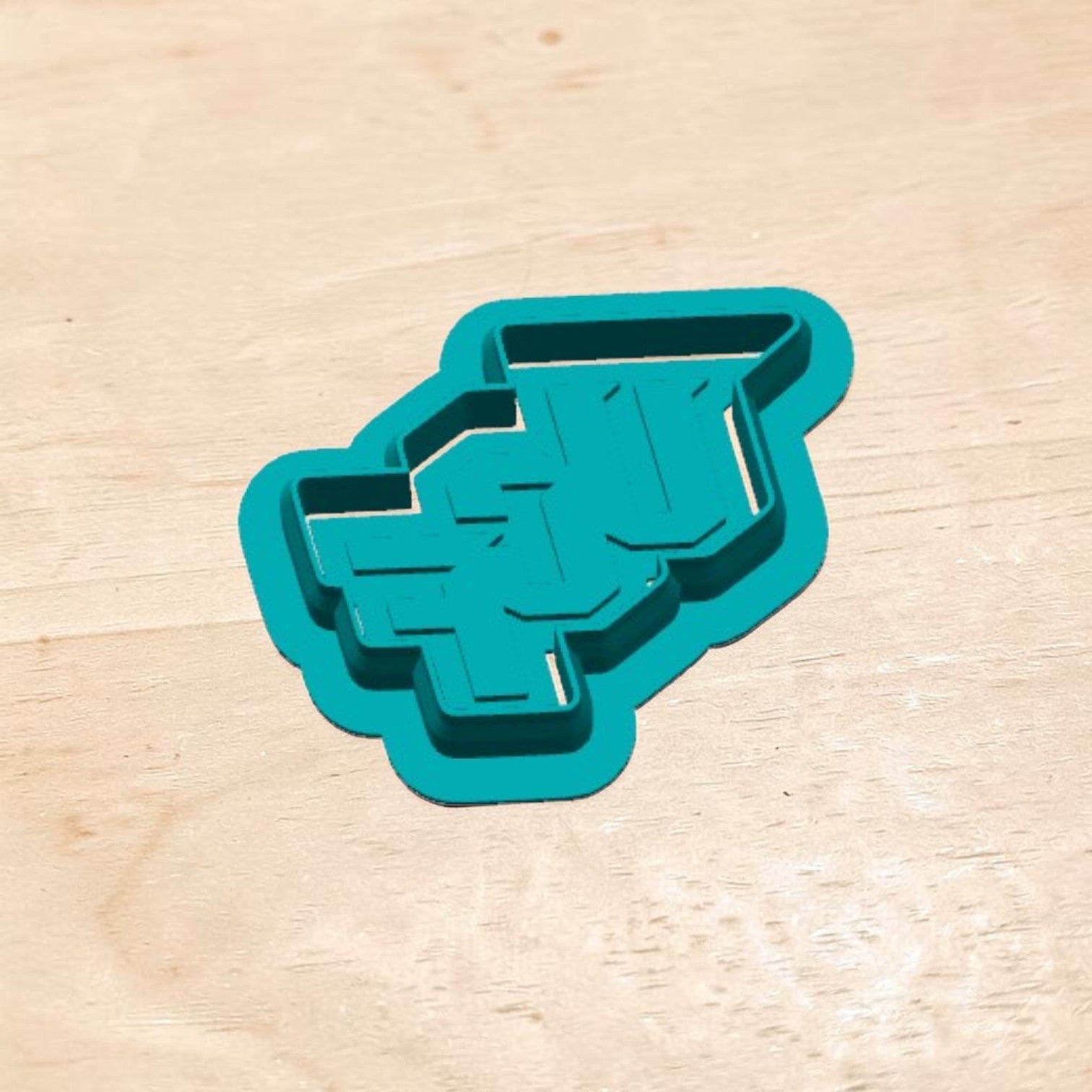 University of Central Florida UCF logo cookie cutter and stamp set — teal 3D‑printed design for cookies, fondant, and polymer clay.